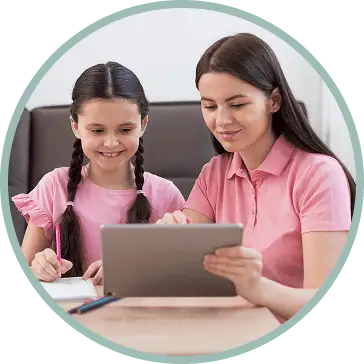A caregiver helping a child learn
